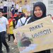 Ibu Hamil Menangkan Hadiah Umroh di Jalan Sehat Kawal Adi For Harum Gubernur 